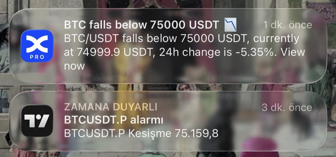The image displays two iPhone notification alerts: one from X Pro stating "BTC falls below 75000 USDT - BTC/USDT falls below 75000 USDT, currently at 74999.9 USDT, 24h change is -5.35%," and another from TradingView (TY) showing a bearish crossover alert "BTCUSDT.P Kesişme 75.159,8."

The post suggests calmly waiting for the daily candle close, which directly relates to the bearish signals shown in both notifications—the price drop below 75,000 USDT and the bearish crossover indicator suggesting further downside potential.