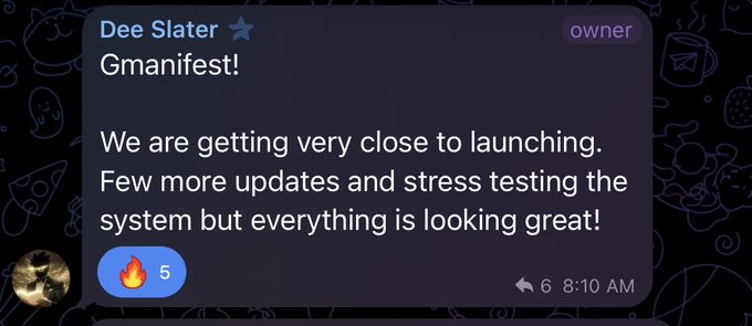 A Telegram message from "Dee Slater" (marked as owner) at 8:10 AM, showing a 🔥 5 reaction, reads "Gmanifest! We are getting very close to launching. Few more updates and stress testing the system but everything is looking great!" The post celebrates the upcoming full launch of $MANIFEST as the first Social Fi Prediction Market, aligning with the message's teaser that the platform is nearly ready to go live after final stress testing.