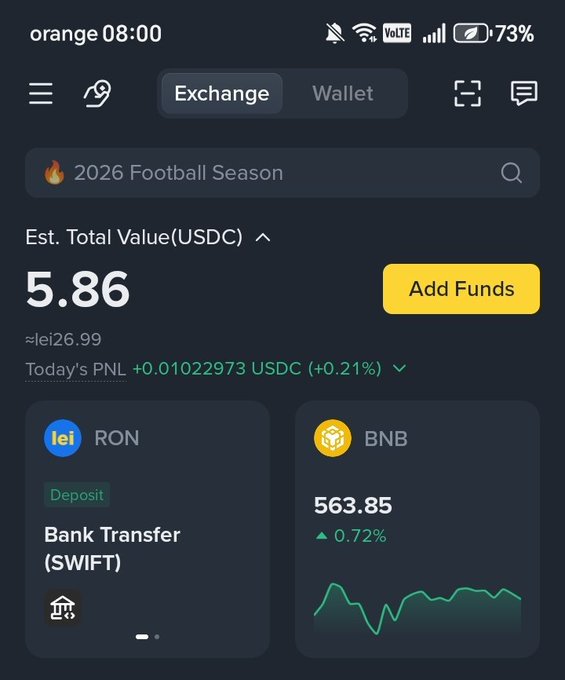 A screenshot of a Binance app showing a nearly empty wallet titled "2026 Football Season" with an estimated total value of only 5.86 USDC (≈lei26.99), displaying minimal holdings of RON and BNB (563.85), reinforcing the poster's claim of withdrawing funds from Binance down to just $5 following the 10.10 liquidation event.