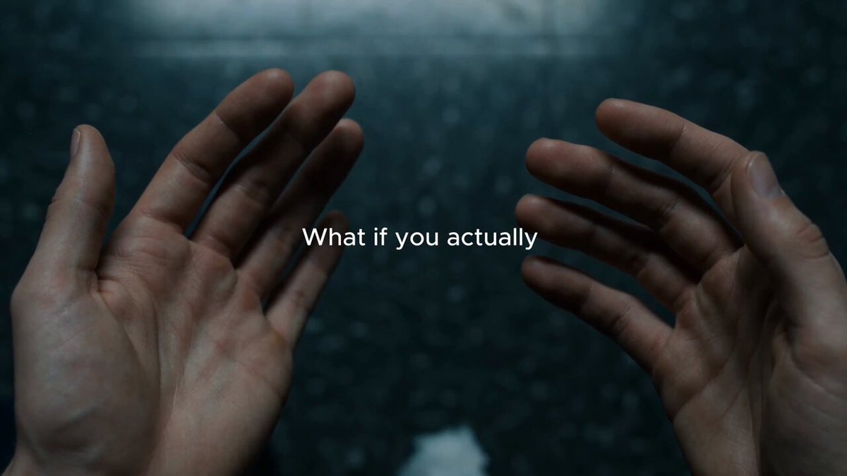 The image shows two hands reaching towards each other, with text above them that reads "What if you actually?". The background of the image is dark blue, which contrasts with the light brown color of the hands. The text appears to be a quote or statement from someone else, possibly on social media.