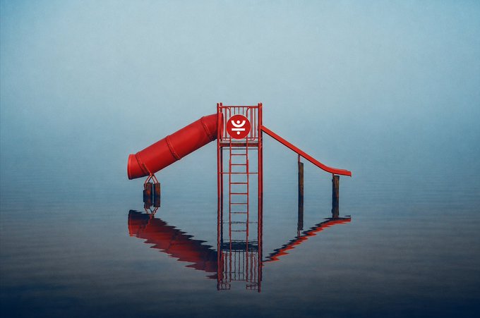 A stylized 3D render of a red playground slide structure standing in calm, reflective water against a muted gray-blue background.
