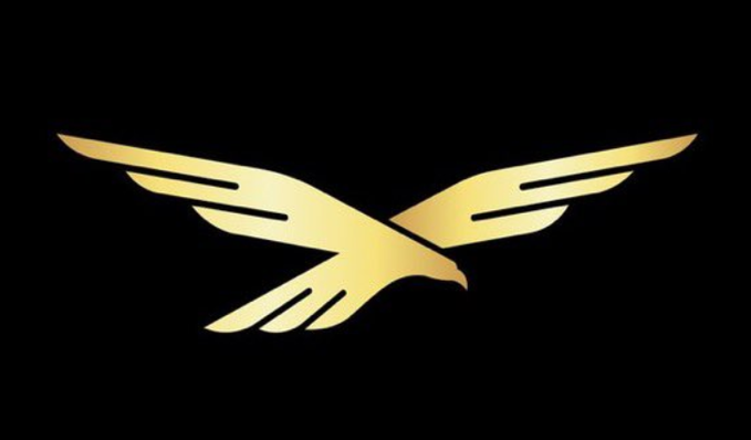 A stylized golden eagle with outstretched wings is displayed on a black background, serving as a striking emblem for the announcement that World Liberty Finance is partnering with ZIG Finance to deploy the $USD1 stablecoin into real-world asset credit markets.