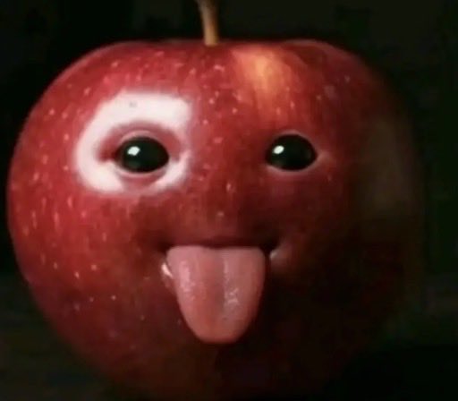 A digitally altered image of a red apple given cartoonish googly eyes and a protruding pink tongue, set against a dark background.