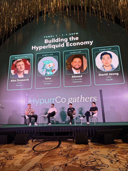 A panel discussion titled 'Building the Hyperliquid Economy' at the 'HypurrCo gathers' event features moderator Alex Svanevik and panelists Taha, Ahmed, and David Jeong on stage.