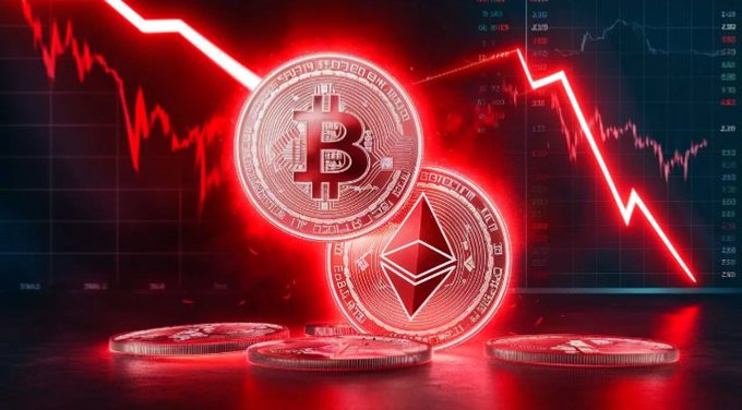 A dramatic image of glowing red Bitcoin and Ethereum coins in the foreground against a background of declining red price charts and falling line graphs, depicting a crypto market crash.