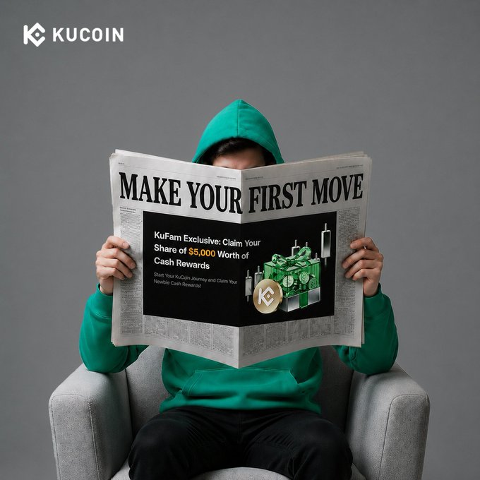 A hooded figure conceals their face behind a newspaper with the headline "MAKE YOUR FIRST MOVE," featuring an embedded KuCoin advertisement promoting a KuFam exclusive offer of $5,000 in cash rewards. The KuCoin logo appears in the top left corner, reinforcing the brand's call to action.