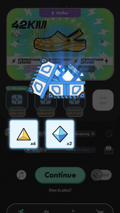 The image shows a phone screen with an app icon displayed, which appears to be a game or puzzle. There are two blue squares on the screen, each containing a different item - one yellow diamond and the other a pair of yellow clogs. The text in the image reads "42KM 4Ki", "Stepn", "4Ki", and "Liv".