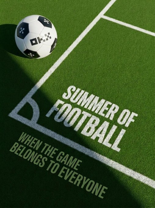 A soccer ball on a green field with white boundary lines, featuring text reading 'SUMMER OF FOOTBALL - WHEN THE GAME BELONGS TO EVERYONE.'
