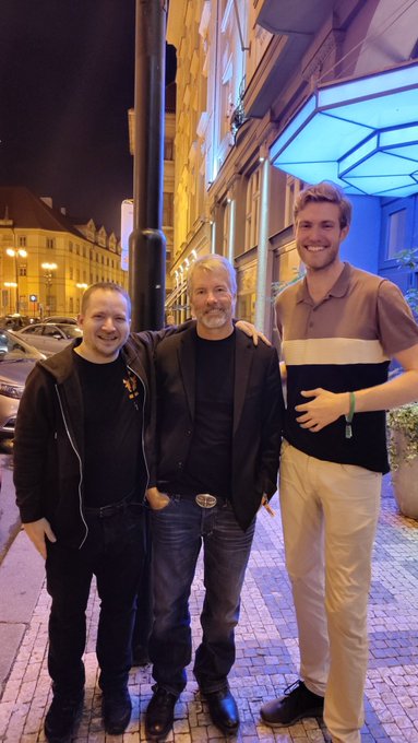 The image shows four men standing together on a city street at night. They appear to be posing for a photo, with one man wearing a black jacket and another wearing a brown shirt. The background includes buildings and cars, indicating that they are in an urban setting. The caption of the image reads "Four years ago @BTCPrague, I made two new friends and we made a pact: never sell our Bitcoin." This suggests that the group of men has been involved with cryptocurrency or Bitcoin for quite some time, possibly as friends who decided to invest their Bitcoins together in 2017.

The post is about Bitcoin, which is likely related to the story behind the four friends' decision to invest in it back then. The image captures a moment from their past and serves as a reminder of their friendship and shared interest in cryptocurrency.