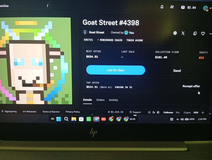 A laptop screen showing a blockchain NFT marketplace listing for 'Goat Street #4398' on Robinhood Chain with a best offer of $534.91.