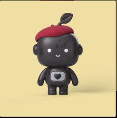 A stylized 3D black robot-like mascot with round eyes stands against a pale yellow background, wearing a red beret and a heart emblem.