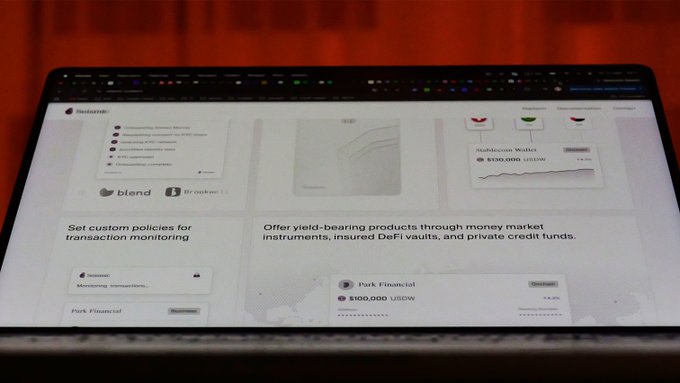 A laptop screen showing a dashboard for a financial platform (blade.finance) displaying options to "Set custom policies for transaction monitoring" and "Offer yield-bearing products through money market instruments, insured DeFi vaults, and private credit funds," including entries like "Stablecoin Wallet" and "Park Financial."