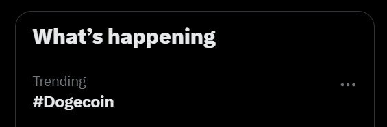 A simple black graphic displaying the text 'What's happening' above a 'Trending' section featuring the hashtag '#Dogecoin'.