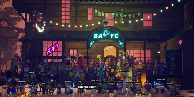 The image features a large group of people gathered outside a building with neon lights, creating an atmosphere of fun and excitement. The crowd consists of both adults and children, indicating that this gathering could be a party or event for everyone involved. The photo captures the essence of the moment, showcasing the joyous occasion and the sense of community among the attendees.