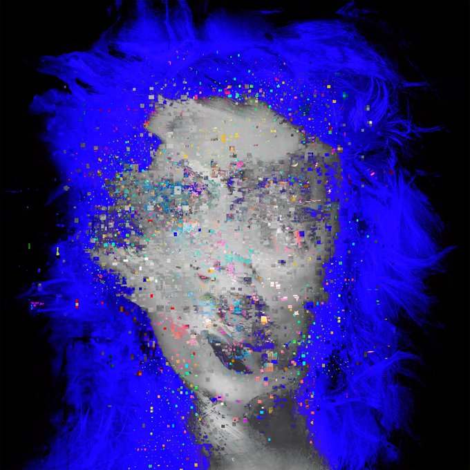 A glitch-art style portrait of a face in grayscale surrounded by vibrant blue feathery textures and colorful pixel-like squares against a black background.