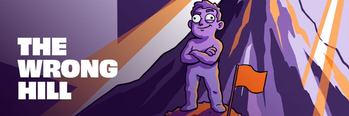 An animated illustration of a purple humanoid figure standing atop a mountain peak next to an orange flag, with the bold text 'THE WRONG HILL' displayed on the left side.