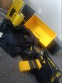 A small, blurry image shows what appears to be a yellow and black figure or character lying on a white surface.