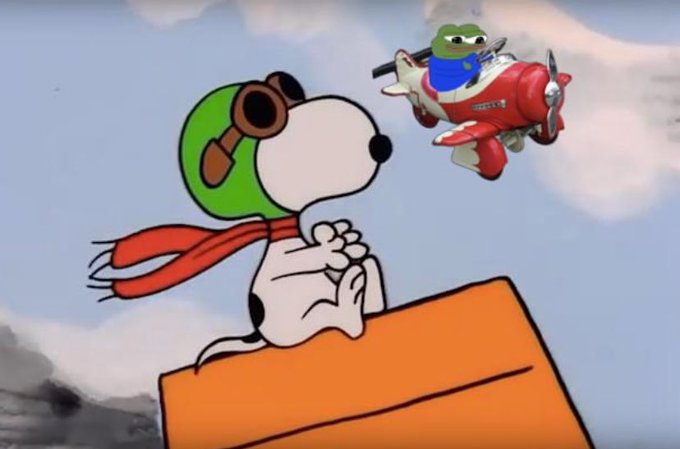 An animated scene of Snoopy dressed as the Flying Ace sitting on his red doghouse, looking up at a frog character piloting a small red airplane through a cloudy sky.