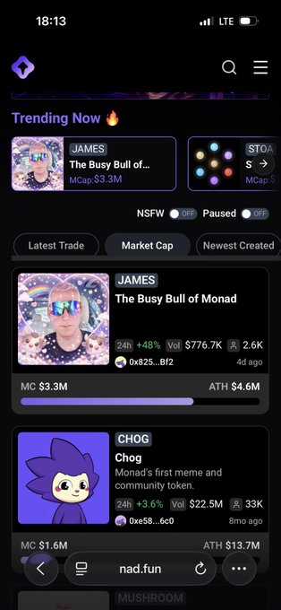 Screenshot of the nad.fun website on mobile showing 'Trending Now' tokens including 'JAMES - The Busy Bull of Monad' with MC $3.3M and 'CHOG - Chog' with MC $1.6M, displayed under dark mode.