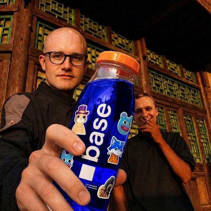 A man holds a blue bottle labeled "base" with cartoon stickers, while another man smiles and smokes behind him, fitting the "based or nothing!" sentiment.