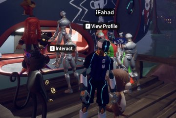 The image shows a group of people standing around, with one person wearing a blue suit and holding a large object that has "I attended the @MeebitsNFTs event at the Futbol Pitch in the Swamp for the World Cup Kick Off" written on it. The other individuals are also dressed in suits or costumes, indicating they might be attending an event related to the game. One person is wearing a red jacket and holding a large object as well. A small robot figure can be seen among them, possibly representing a character from the game.