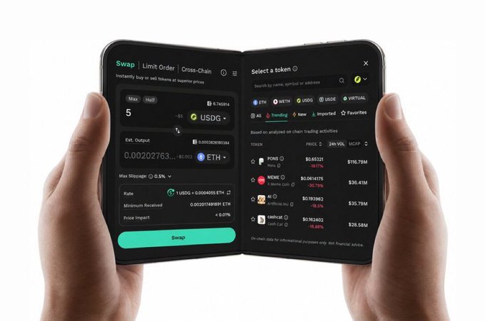 Two hands hold a foldable smartphone displaying a cryptocurrency swap interface, showing options for ETH, USDG, PONS, MEME, AI, and catshack tokens.