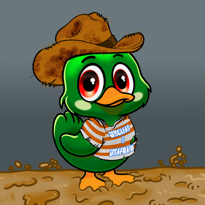 Cartoon illustration of a green duck character wearing a brown cowboy hat and a striped shirt that says 'UNCLESAM & UNAFRAID', standing in mud.