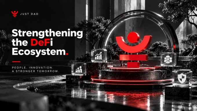 A red and black promotional image for Just DAO reading 'Strengthening the DeFi Ecosystem' and 'PEOPLE. INNOVATION. A STRONGER TOMORROW.', featuring a 3D red logo under a glass dome.