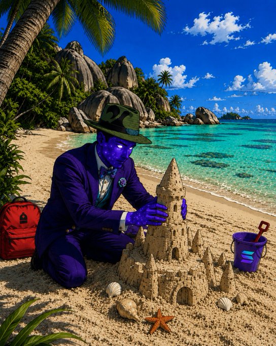 A purple-skinned character in a sharp suit and green fedora building an elaborate sandcastle on a tropical beach, with a red backpack nearby featuring the Aptos logo and a purple bucket bearing the Solana logo.