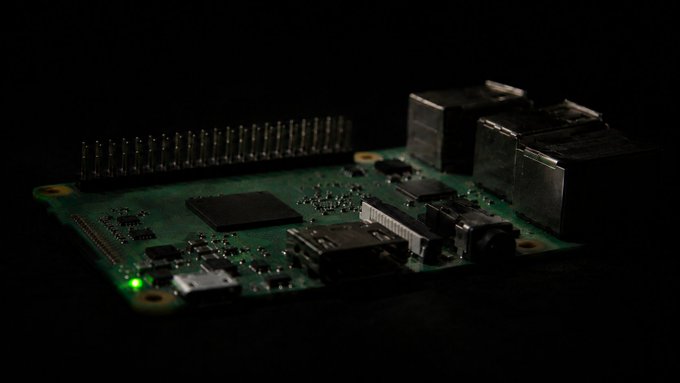 A Raspberry Pi single-board computer is shown against a black background, featuring its characteristic GPIO pins, USB ports, Ethernet jack, and a glowing green LED indicator. The image illustrates that "Supernova can run on this" compact, affordable hardware, highlighting the lightweight software requirements of the project.
