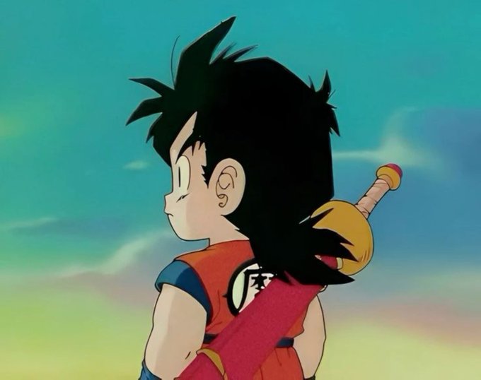 An anime character with spiky black hair, wearing an orange gi and carrying a sword on their back, gazes into a sunset sky with the kanji "悟" (Go/Goku) visible on their uniform. The image evokes a sense of perseverance and determination, complementing the post's motivational quote about persistence, while the character appears to be Goku from Dragon Ball, tying into the "GM Saiyans" greeting.
