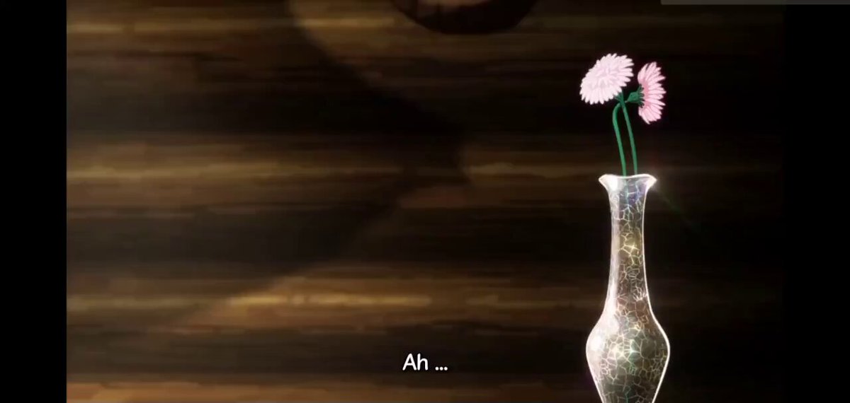 The image features a vase with two pink flowers sitting on top of a wooden table. The background shows a dark wood grain patterned wall that adds depth to the scene. Below the vase, there's text that reads "AH ... Ah ... Ah ... Ah ... Ah ... Ah ... Ah ... Ah ... Ah ... Ah ... Ah ... Ah ... Ah ... Ah ... Ah ... Ah ... Ah ... Ah ... Ah ... Ah ... Ah ... Ah ... Ah ... Ah ... Ah ... Ah ... Ah ... Ah ... Ah ... Ah ... Ah ... Ah ... Ah, Ah ... Ah ... Ah ... Ah!" The text is in white and black.