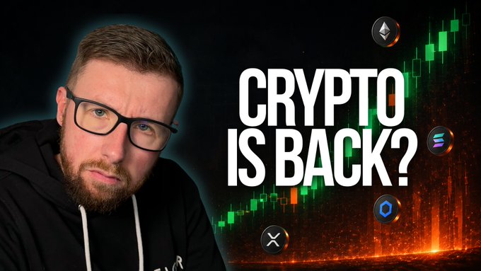 A YouTube thumbnail featuring a bearded man with glasses next to bold text reading 'CRYPTO IS BACK?' alongside cryptocurrency logos (Ethereum, Solana, XRP) and a green trading chart.