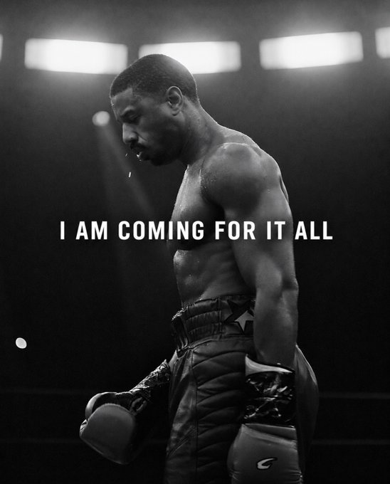 A black-and-white motivational poster features a shirtless boxer in profile with boxing gloves, overlaid with the text 'I AM COMING FOR IT ALL'.