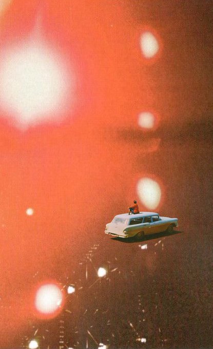 A surreal artistic image showing a small white car driving through a pink and red space-like environment with bright lights, with a tiny figure standing on top of the car.