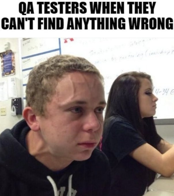 The image shows a young man with blonde hair wearing a black hoodie sitting at a desk next to a woman who has long brown hair, both looking away from the camera. The background of the image features a whiteboard or board behind them. There is also text in the image that reads "qa tests when they can't find anything wrong".