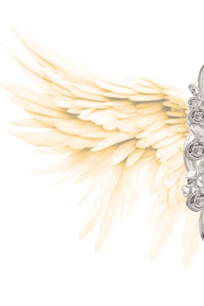 A close-up showing the detailed cream-colored feathers of an angel wing attached to a silver-toned jeweled base.
