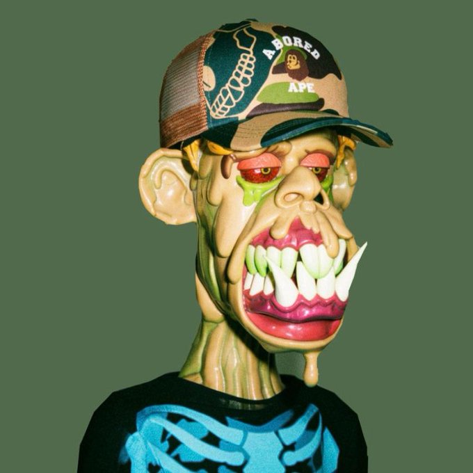 A 3D rendered grotesque character with exaggerated facial features, large teeth, and green slime wears a camo hat with 'ABORED APE' text and a skeleton shirt.