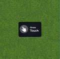Small image showing a 'Claim Touch' notification badge centered on a green grass-textured background.