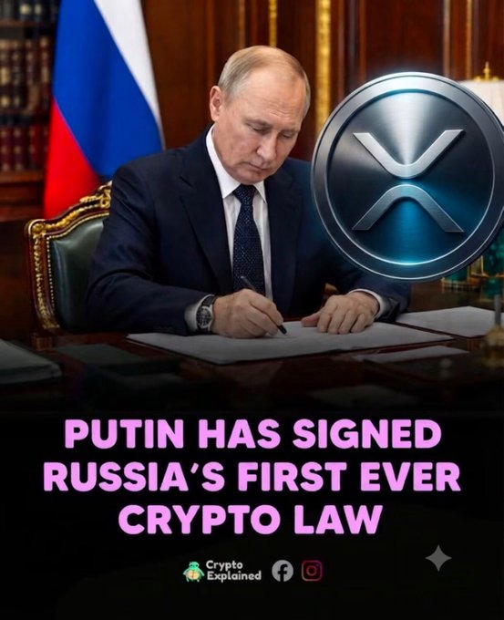 This image features President Putin signing a document alongside the XRP logo, used to illustrate a news headline stating, "PUTIN HAS SIGNED RUSSIA'S FIRST EVER CRYPTO LAW."