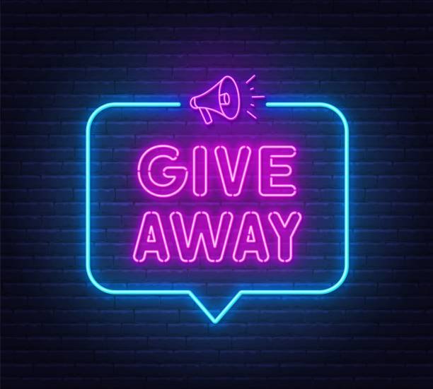 A glowing neon sign mounted on a dark brick wall displays the text 'GIVE AWAY' in pink letters within a blue speech bubble outline, topped with a pink megaphone icon.