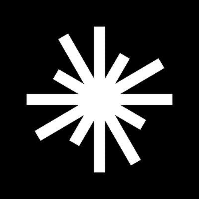 A white asterisk or burst symbol with eight elongated rays extending in various directions is displayed against a solid black background.
