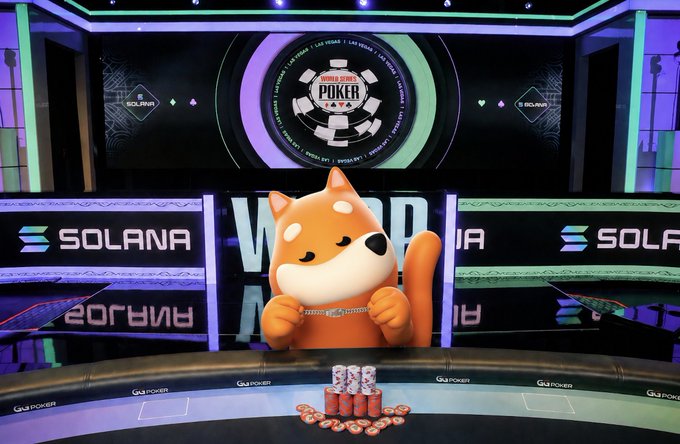 An orange cartoon cat character with a white muzzle holds a chain at a poker table, with 'SOLANA' branding visible on screens and the table in the background.