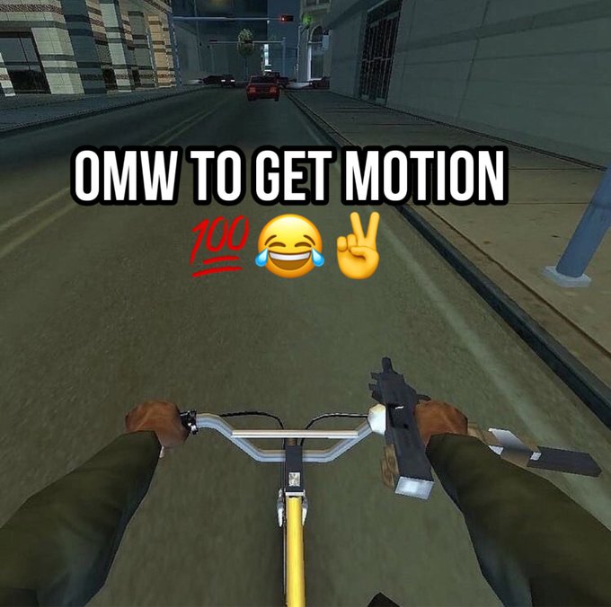 A Grand Theft Auto San Andreas screenshot showing a first-person view riding a bicycle down a city street while holding a gun, with text 'OMW TO GET MOTION' and 100 emoji.