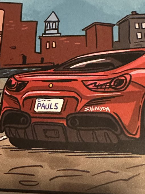 A cartoon-style illustration of the rear of a red sports car with the license plate 'PAUL5' and the signature 'SHINODA', parked on a street with brick buildings in the background.