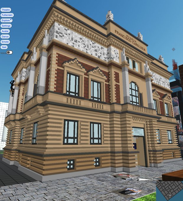 A screenshot from a virtual world or game (likely VRChat based on the UI) showing a blocky, low-poly recreation of a real-world theater building. The building has signage reading 'TEATRO MUNICIPAL FRANCISCO CAROLINO' and a menu on the left lists options like 'Theatre', 'Fullscreen', and 'Settings'.
