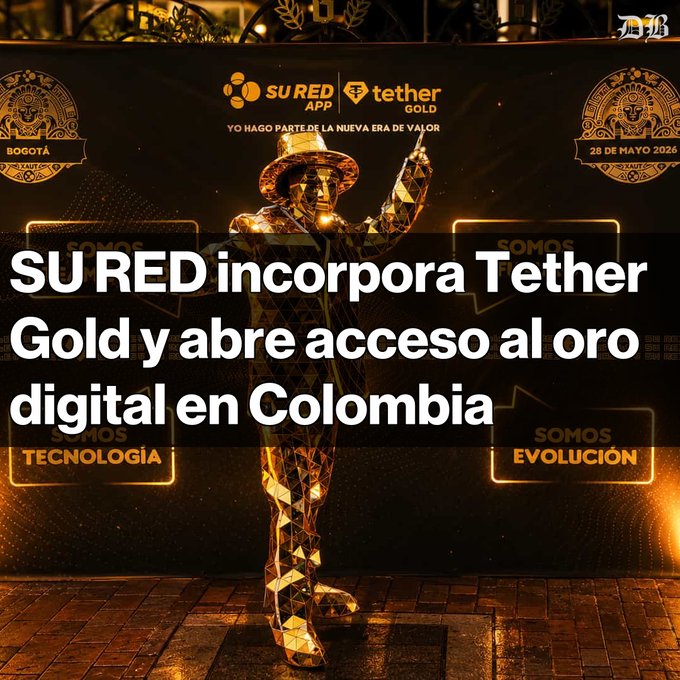 The image features a man dressed as a golden statue standing next to a black banner with white text that says "SU RED incorporationa Tether Gold y abre accesso al oro digital en colombia". The man appears to be wearing a hat, and he is holding up his hand.

In the background of the image, there are several other people present who seem to be attending an event or gathering. A sign can also be seen in the scene that reads "SUMO DE LA PTABOLA".
