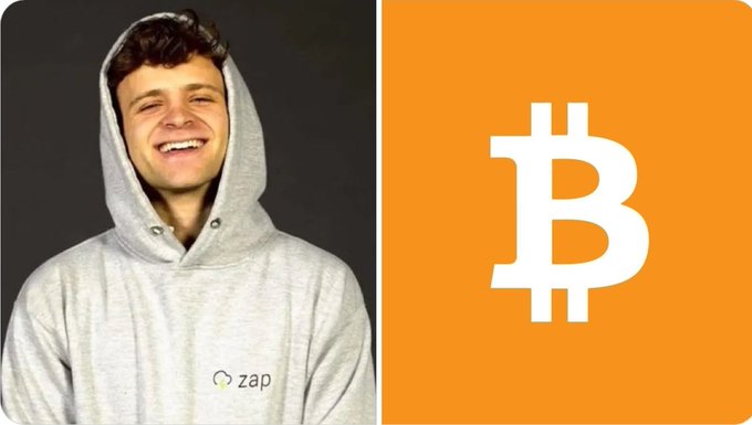 A young man wearing a gray "Zap" hoodie smiles on the left side of the image, paired with a large Bitcoin (₿) logo on an orange background on the right, visually representing Jack Mallers' bullish stance on Bitcoin reaching $1,000,000+ while other cryptocurrencies decline.