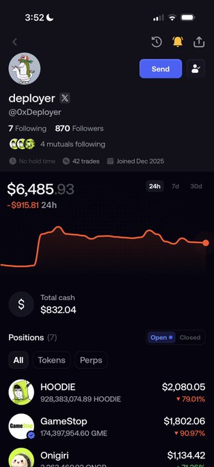 A mobile app screenshot shows a trading account named 'deployer' (@OxDeployer) with a total value of $6,485.93, down ~$915.81 in 24h, holding positions like HOODIE, GameStop, and Onigiri.