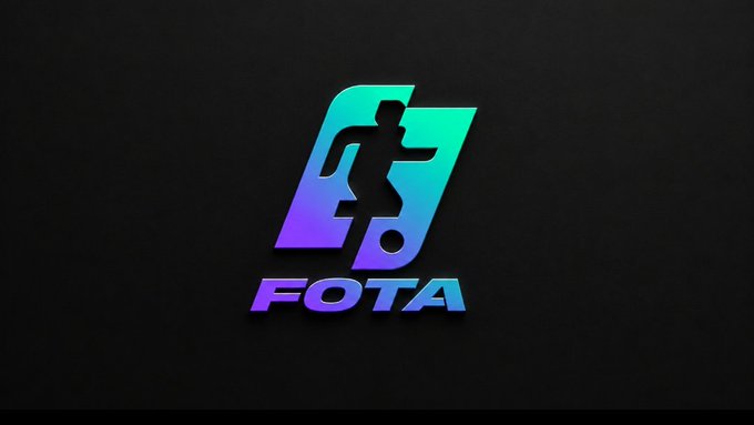 The image features a logo for a company named FOTA, which stands out against a black background. The logo consists of a stylized representation of a person running with their arms raised high above their head. The colors used in the logo are blue, green, and purple, creating a vibrant and eye-catching design. The text "Will Be Live Soon On" is also present on the image, indicating that the company's services will be available soon for viewers to interact with.